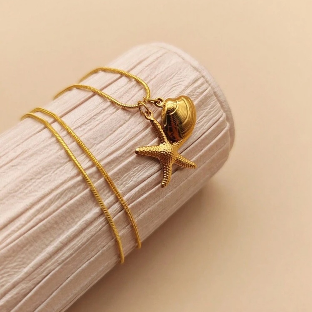 Meg N’ Mau jewels necklace stainless steel 18 K.